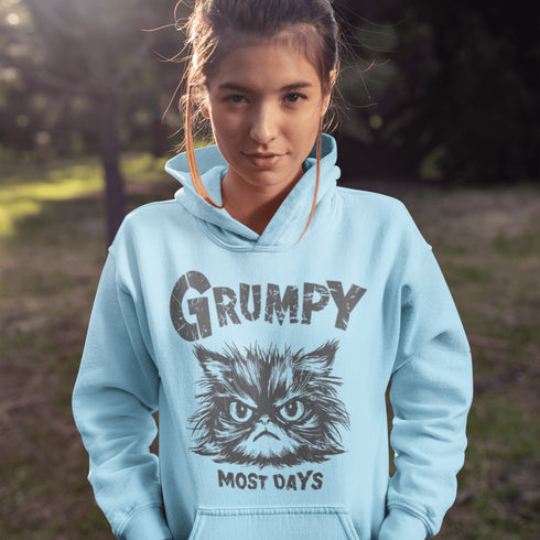 Introducing the "Grumpy Most Days" Hoodie—because let's face it, some days just require a permanent scowl. Featuring the grumpiest cat you’ve ever seen, this hoodie is perfect for those days when coffee, sunshine, or people just aren't cutting it. 😾☕️